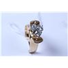 Image 1 : Lady's 14kt yellow gold and diamond ring set with three brilliant cut white diamonds