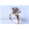 Image 2 : Lady's 14kt yellow gold and diamond ring set with three brilliant cut white diamonds