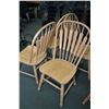 Image 1 : Four Richardson Bros. stylized arrow back dining chairs
