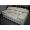 Image 1 : White leather loveseat with fold up head rest design originally purchased from Finese Furnishings