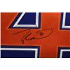 Image 2 : Shadow box framed handsigned blue and orange No. 4 Hull Oilers jersey with promo photos and pucks