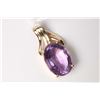 Image 1 : Ladies 18kt yellow gold and oval mixed cut 9.25ct amethyst gemstone. Retail replacement value $1,100