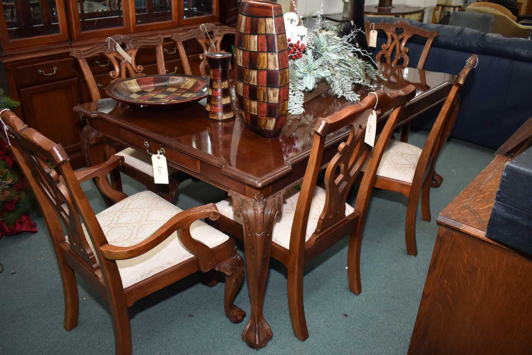 Chippendale style mahogany dining room table with carved ball and claw ...