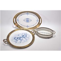 Three antique porcelain trays, all with brass and steel galleys