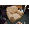 Image 2 : Genuine leather sand tone loveseat and matching armchair, both with large nail head decoration