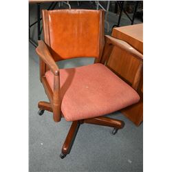 Vintage open arm swivel office chair made by Krug