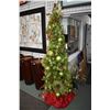Image 1 : Fully decorated and illuminated artificial Christmas tree decorated at the Festival of Trees and a C