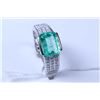 Image 1 : Lady's 14kt white gold, diamond and emerald gemstone ring set with 1.50ct emerald cut emerald gemsto