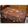 Image 1 : Antique leather suitcase with travel stickers including Paris, Zurich, Brussels etc.