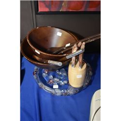 Selection of kitchen items including cake plate, steak knives and salad bowls