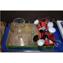 Selection of modern bar items including wine decanter, black and white glass stemware and a set of a