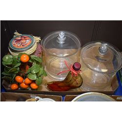 Selection of modern glass decor items including two large lidded canisters, glass shoe with peppers,