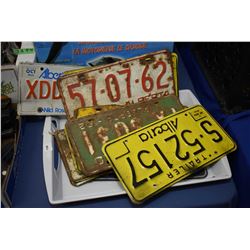 Selection of vintage Alberta licence plates including 1958, 1960, 1962, etc.