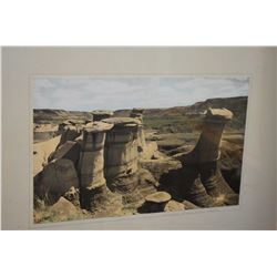 Two framed colour photographs including Hoodoos by Drumheller and Red Deer River by Drumheller