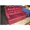 Image 1 : Two seater burgundy upholstered loveseat