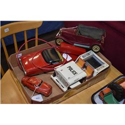 Selection of vintage toys including a remote control convertible T-bird, a Japanese made police jeep