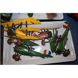 Four cast aluminium airplane motif wall plaques