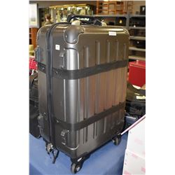 Hard sided travel case with pull out handle and wheels