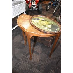 Matched grain English walnut back to the wall table and a convex glass picture frame with print