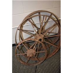 Three vintage metal wagon wheel, two 26" and one 16"