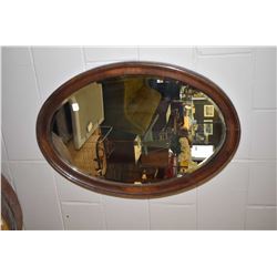 Oak framed bevelled wall mirror, 31" X 21"