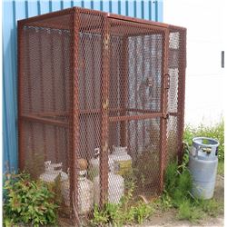 METAL CAGE WITH PROPANE TANKS