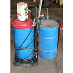 2 BARRELS OF DELCO GREASE ON PORTABLE ROLLER WITH