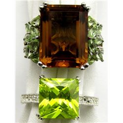 2-STERLING BLING RINGS WITH LARGE GREEN CNTR