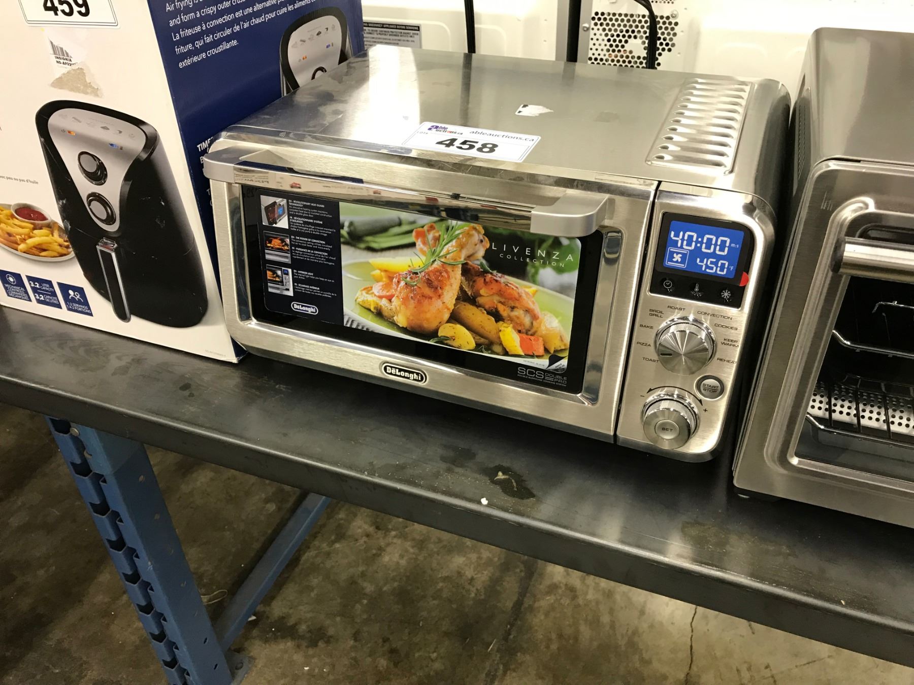 DELONGHI STAINLESS STEEL COMPACT CONVECTION/TOASTER OVEN - Able Auctions