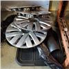 Image 2 : SET OF GOOD YEAR RUBBER FLOOR MATS VW HUB CAPS, TIRE BAG, AND SQUEEGEE