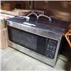 Image 1 : LG STAINLESS AND BLACK MICROWAVE
