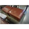 Image 1 : 2 BROWN LEATHER OTTOMANS