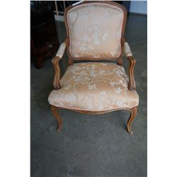 CARVED WOOD UPHOLSTERED ARM CHAIR