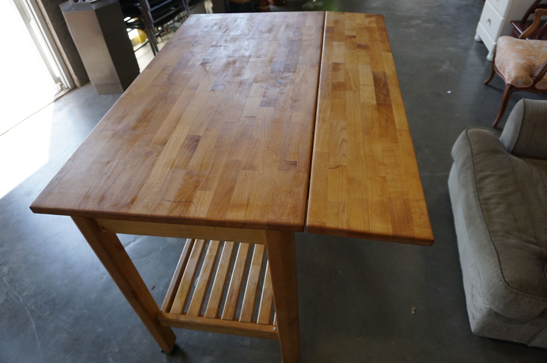 ROLLING WOODEN BUTCHER BLOCK ISLAND TABLE - Big Valley Auction butcher block folding table