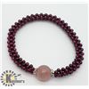 Image 1 : FLEXIBLE GARNET AND ROSE QUARTZ BEAD BRACELET
