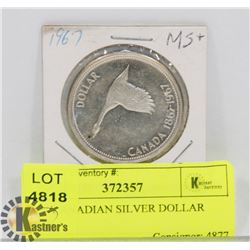 1967 CANADIAN SILVER DOLLAR COIN.