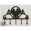 Image 1 : VINTAGE CAST IRON CLOTHES HANGER WITH FIVE HOOKS.