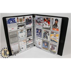 BINDER OF OVER 230 ROOKIE HOCKEY CARDS -