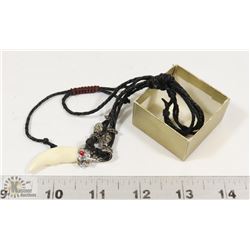 TOOTH PENDANT.