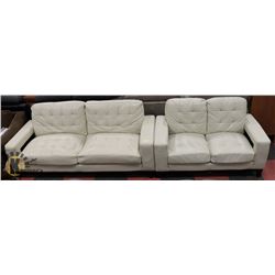 86" IVORY LEATHER SOFA WITH MATCHING 60" LOVESEAT.