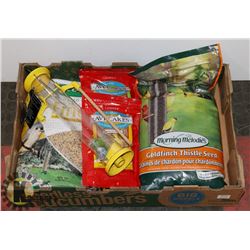 LARGE FLAT OF ASSORTED BIRD SEED AND FEEDER.