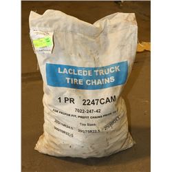 NEW BAG OF LARGE TIRE CHAINS, SEE BAG FOR SIZES