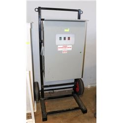ELECTRIC DISTRIBUTION PANEL ON RACK WITH WHEELS.