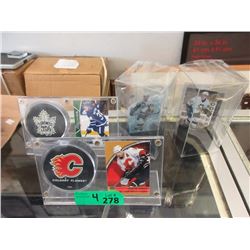 4 Hockey Card and Puck Sets - protective cases