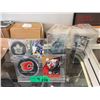 Image 1 : 4 Hockey Card and Puck Sets - protective cases