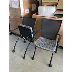 Rolling conference room chair with folding seat