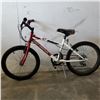 Image 1 : WHITE SUPER CYCLE BIKE AND ORANGE COAST MOUNTAIN BLUR BIKE