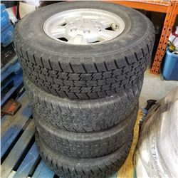 SET OF 4 15" GMC RIMS AND RUBBER LT235/75 R15 TIRES