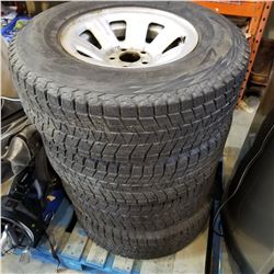 SET OF 4 15" TIRES ON FORD RIMS