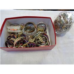 BOX OF BANGLES AND GLASS VASE OF JEWELLERY